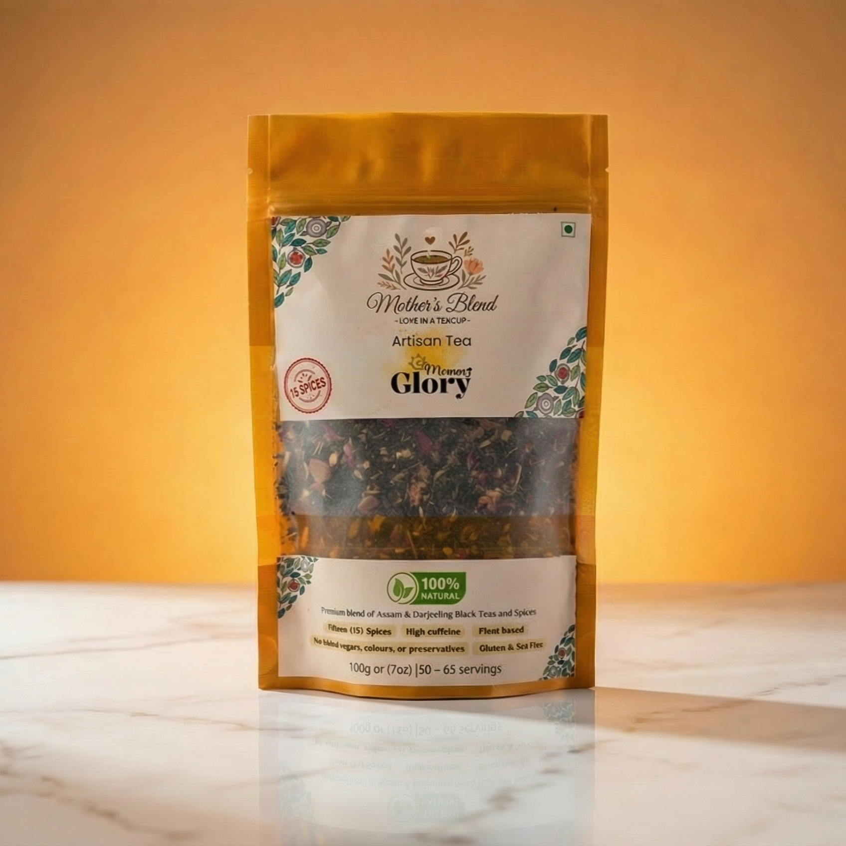 Black tea package of 'Mothers Blend' labeled 'Morning Glory' on a marble surface with a warm background